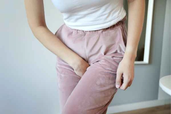 woman running for the toilet because of urinary incontinence West Ham